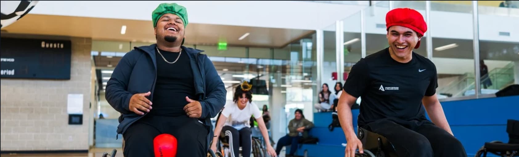 Students in wheelchairs playing game